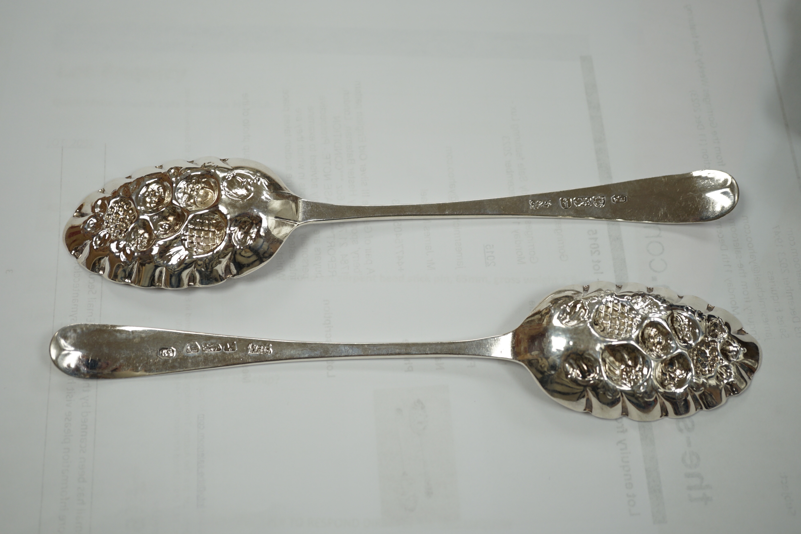 A pair of George III silver Old English pattern 'berry' spoons by Hester Bateman, London, 1784, 21.7cm, 3.6oz.